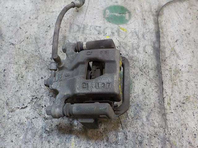 Zacisk hamulcowy tylny prawy 440011KD0A NISSAN