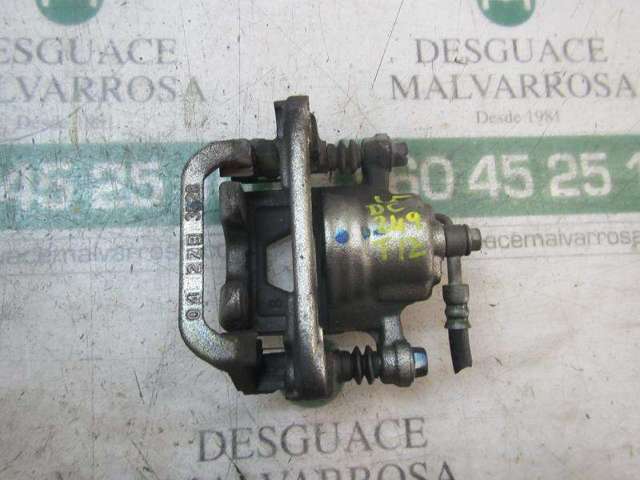 Zacisk hamulcowy tylny lewy 440111KD0A NISSAN