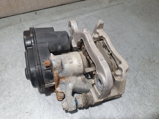 Zacisk hamulcowy tylny lewy 440114EA0A NISSAN