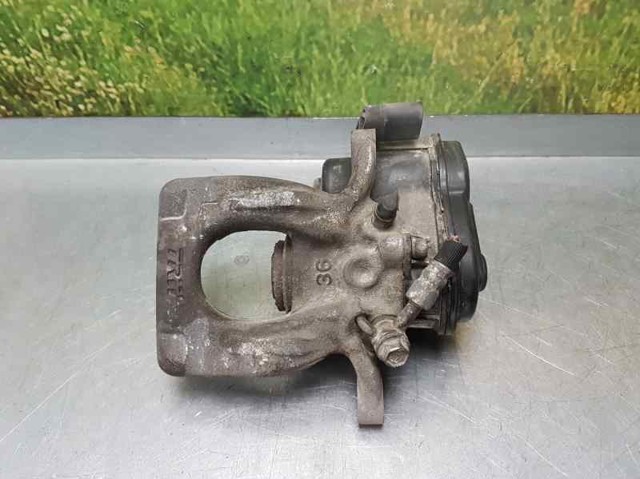 Zacisk hamulcowy tylny lewy 440114EA0A NISSAN