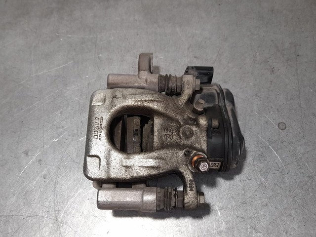 Zacisk hamulcowy tylny lewy 440114EA0A NISSAN