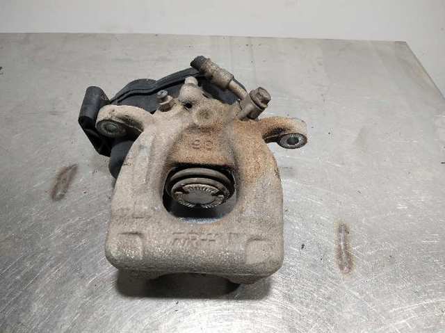 Zacisk hamulcowy tylny lewy 440114EA0A NISSAN