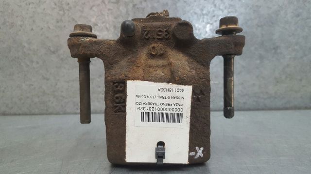 Zacisk hamulcowy tylny lewy 440118H30A NISSAN