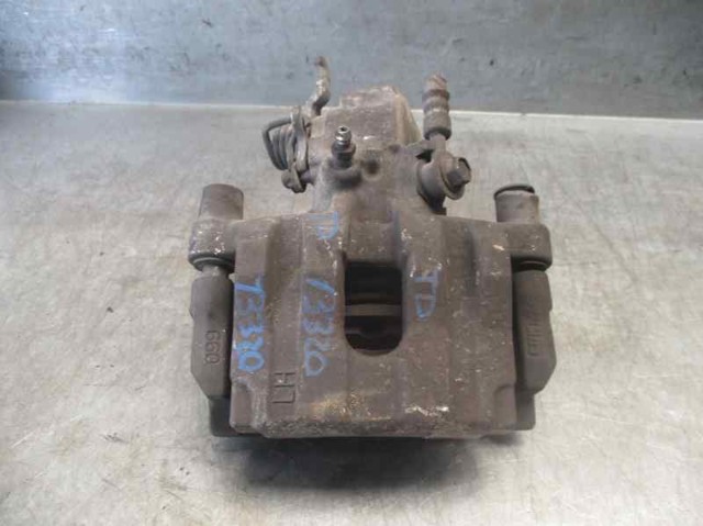 Zacisk hamulcowy Nissan Primera