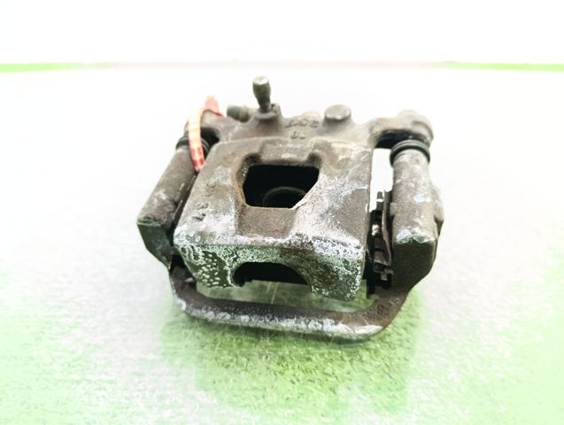 Zacisk hamulcowy tylny lewy 44011EM11A NISSAN