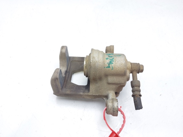 Zacisk hamulcowy tylny lewy 44011EM11A NISSAN