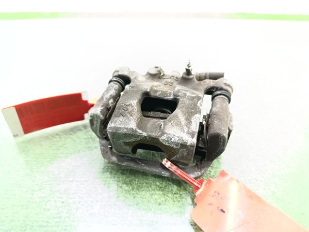 Zacisk hamulcowy tylny lewy 44011EM11A NISSAN