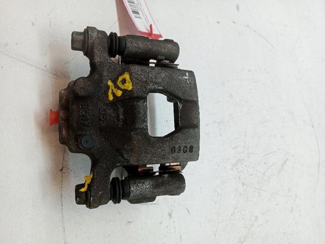 Zacisk hamulcowy tylny lewy 44011EM11A NISSAN