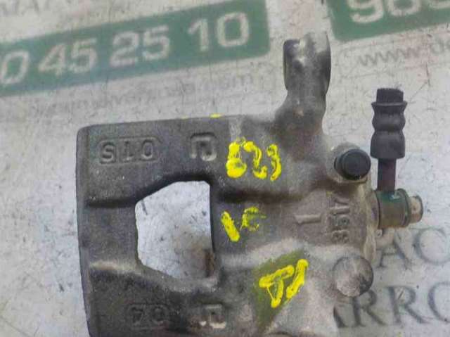 Zacisk hamulcowy tylny lewy 44011EM11A NISSAN