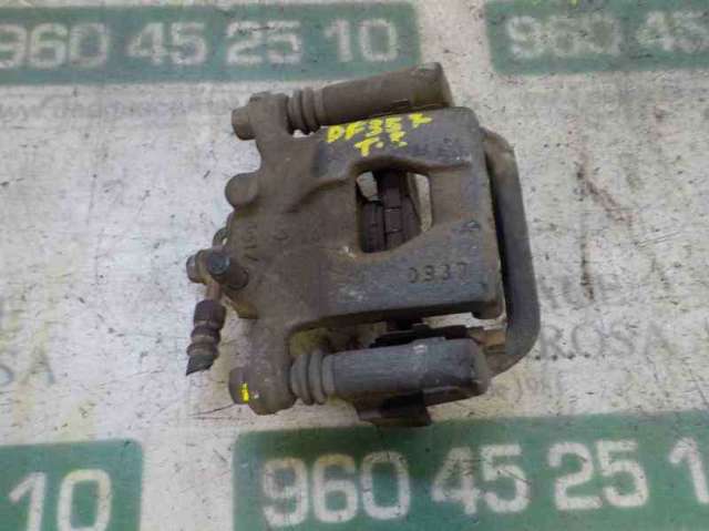 Zacisk hamulcowy tylny lewy 44011EM11A NISSAN