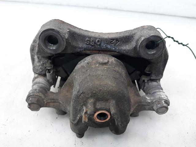 Zacisk hamulcowy tylny lewy 44011VB200 NISSAN