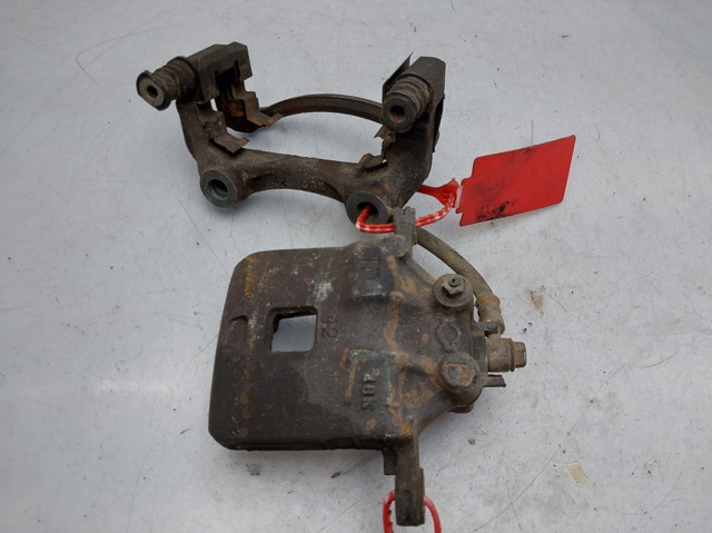Zacisk hamulcowy tylny lewy 44011VS40A NISSAN