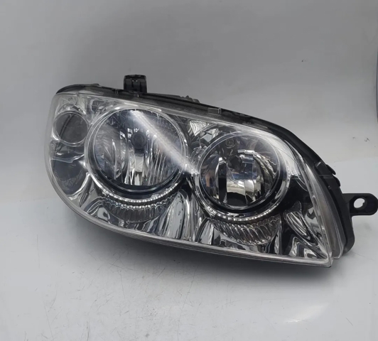 Reflektor prawy 46849354 FIAT