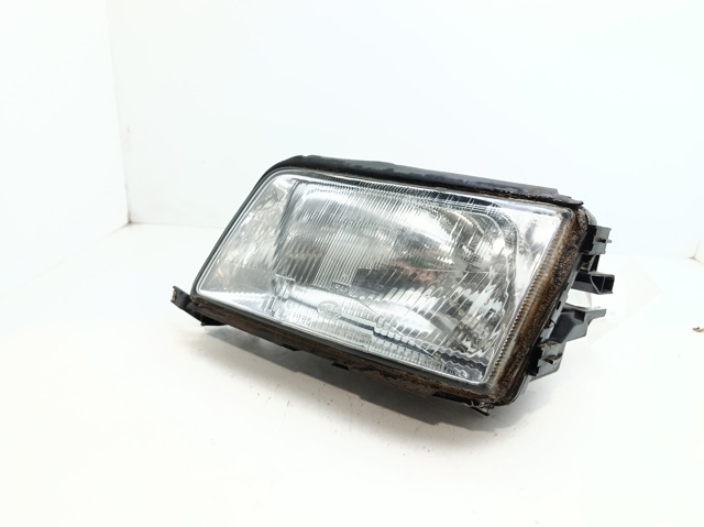 Reflektor lewy 4A0941029 VAG