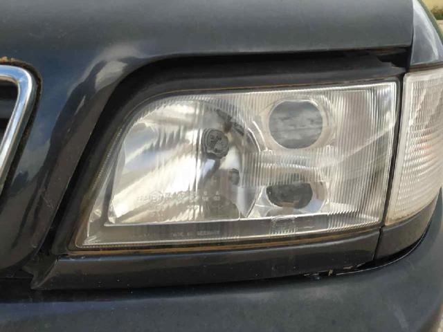 Reflektor lewy 4A0941029N VAG