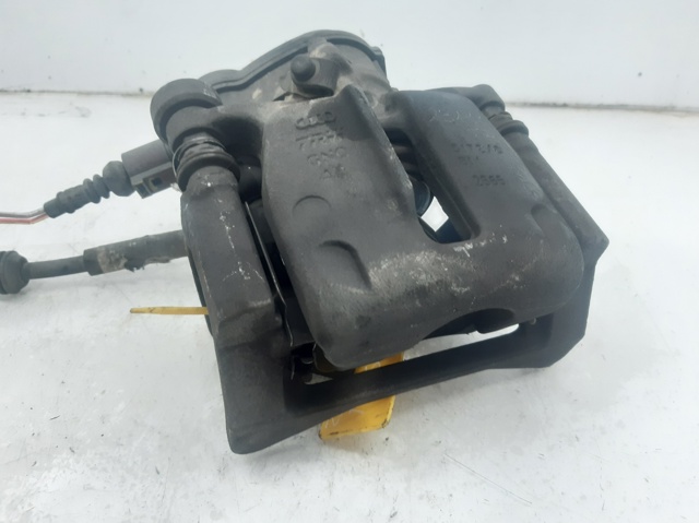 Zacisk hamulcowy tylny prawy 4G0615404 VAG