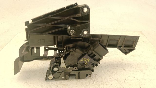 Zamek drzwi tylnych lewych 4M5AR26413BE FORD