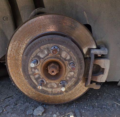 Zacisk hamulcowy tylny prawy 5142564AA CHRYSLER