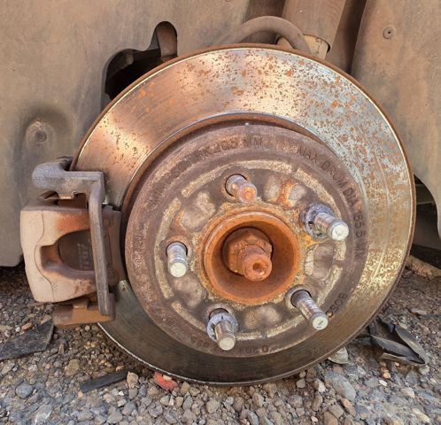 Zacisk hamulcowy tylny lewy 5142565AA CHRYSLER