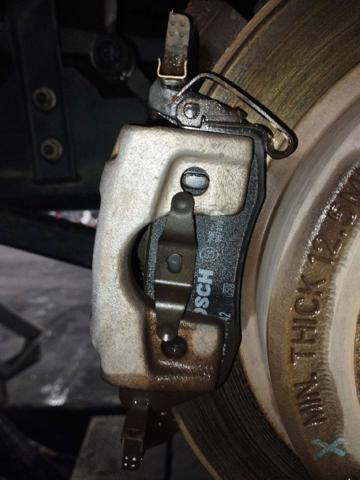Zacisk hamulcowy tylny lewy 5143703AB CHRYSLER