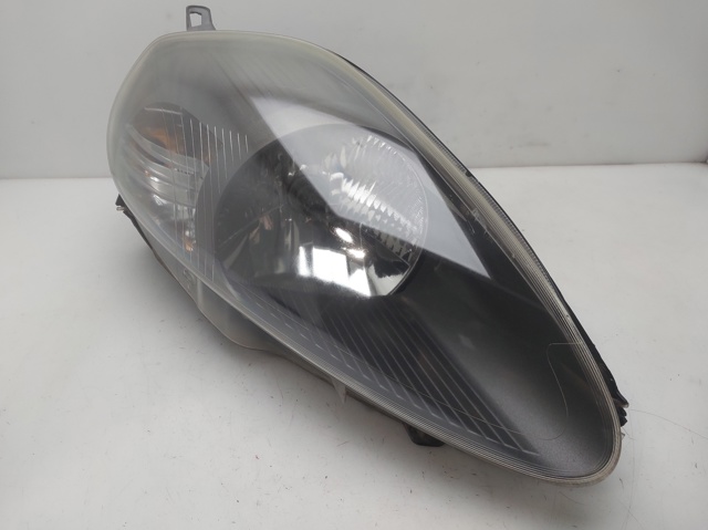 Reflektor prawy 51701594 FIAT