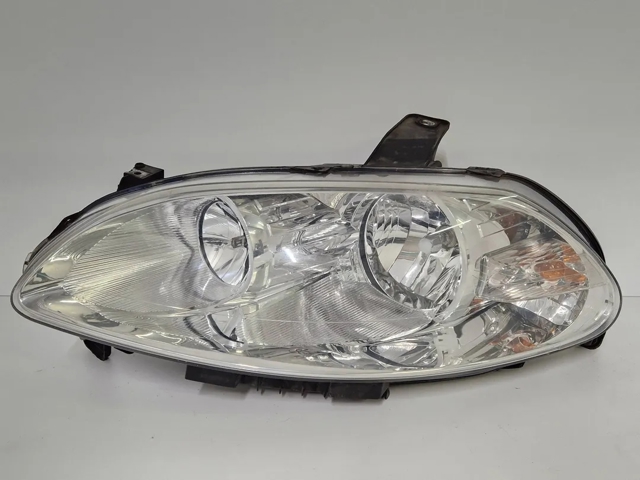 Reflektor lewy 51801266 FIAT