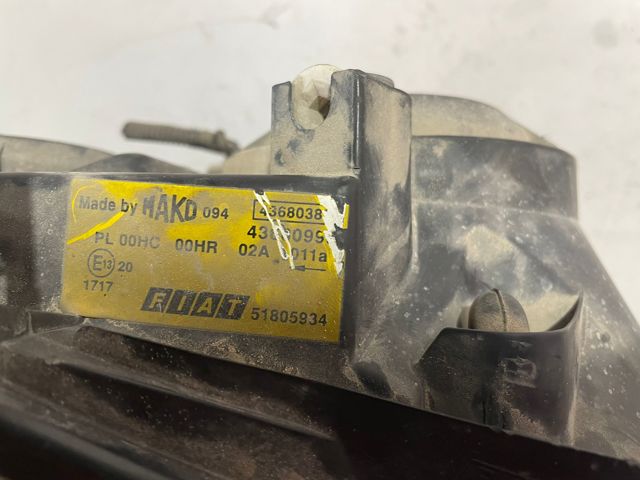 Reflektor prawy 51805934 FIAT