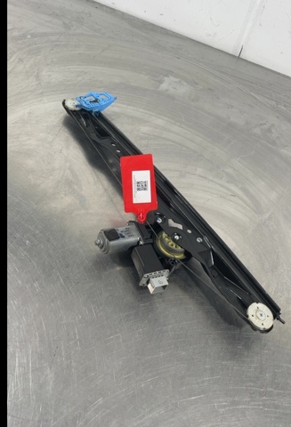 Mechanizm podnoszenia szyby drzwi przednich lewych 52063786 OPEL
