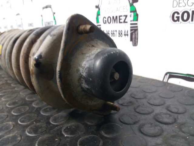Amortyzator przedni prawy 543025F625 NISSAN