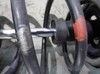 Amortyzator przedni lewy 54303AV620 NISSAN