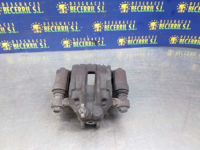 Zacisk hamulcowy tylny lewy 582102E300 HYUNDAI