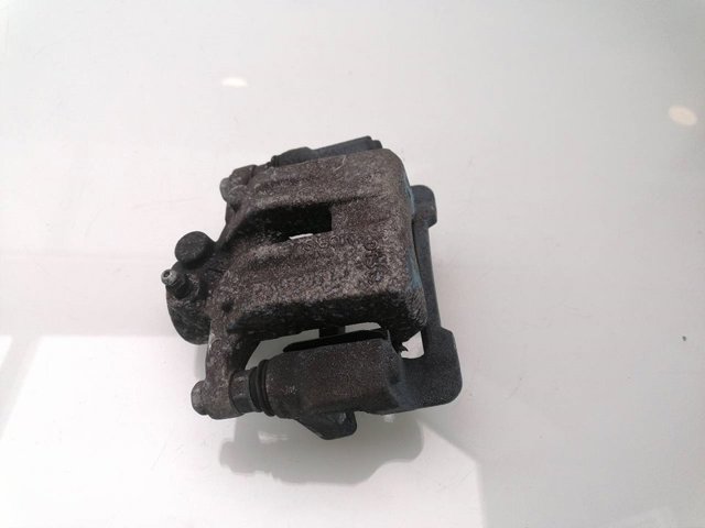 Zacisk hamulcowy tylny lewy 582102Y310 HYUNDAI