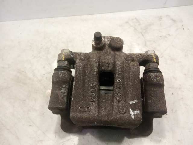 Zacisk hamulcowy tylny lewy 582102Y310 HYUNDAI