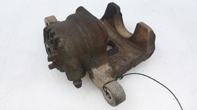 Zacisk hamulcowy tylny lewy 582103E000 HYUNDAI