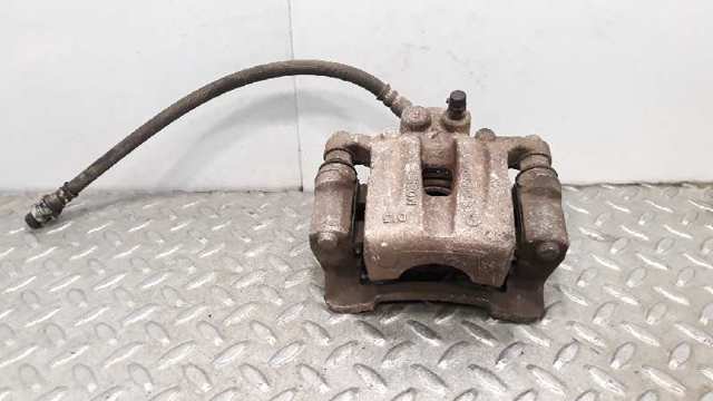 Zacisk hamulcowy tylny prawy 582302Y300 HYUNDAI