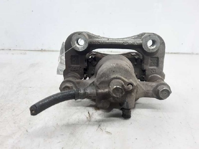 Zacisk hamulcowy tylny prawy KIA Sportage 4 QL
