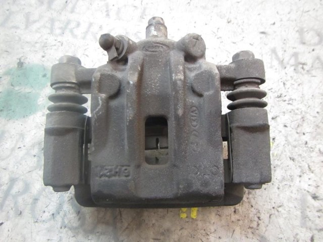 Zacisk hamulcowy tylny lewy 583001G300 HYUNDAI