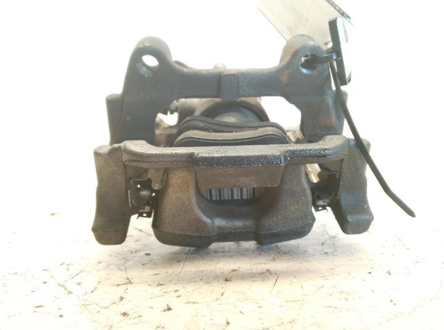 Zacisk hamulcowy tylny lewy 5K0615423 VAG