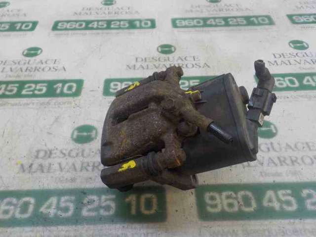 Zacisk hamulcowy tylny lewy 5N0615403 VAG