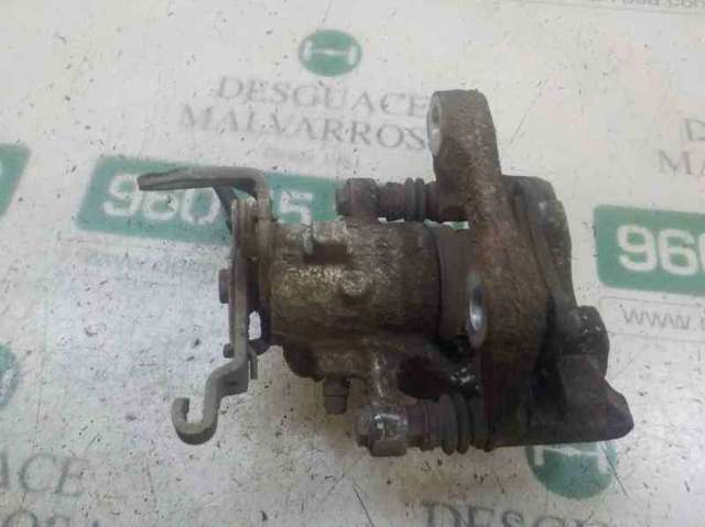Zacisk hamulcowy tylny lewy 5Q0615423A VAG