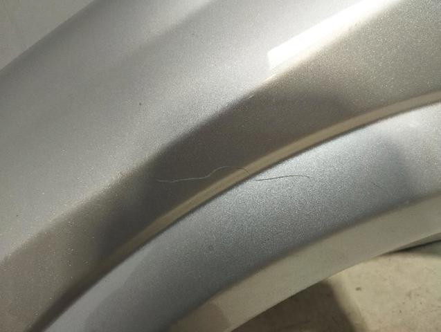 Błotnik przedni lewy 6101327 OPEL