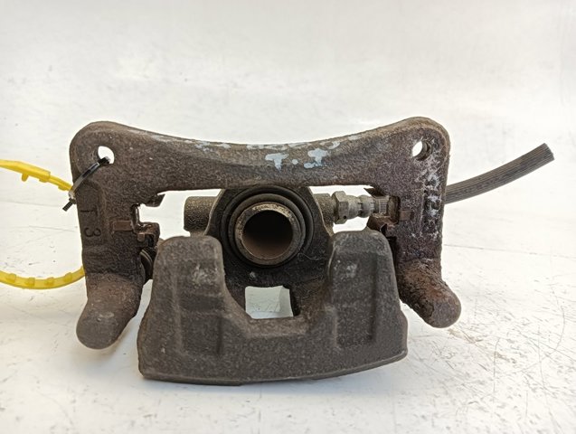 Zacisk hamulcowy tylny lewy 68020261AB CHRYSLER