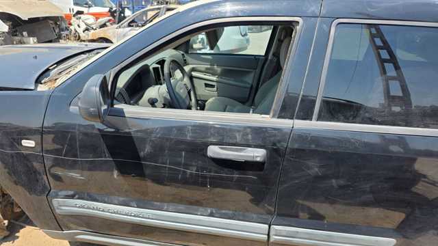Kupić Drzwi przednie lewe Jeep Grand Cherokee   w dobrej cenie