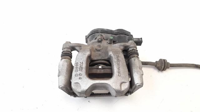 Zacisk hamulcowy tylny lewy 68338709AA CHRYSLER
