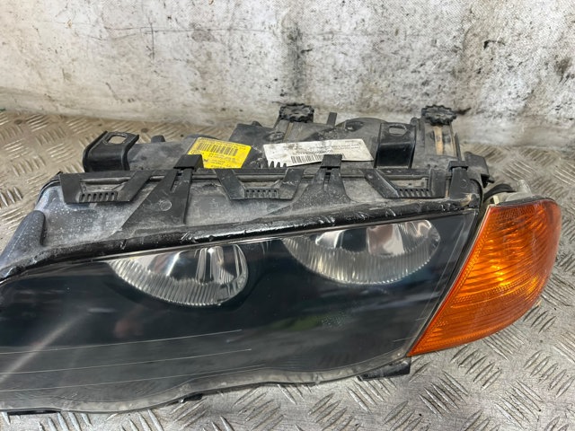 Reflektor lewy 6902745 BMW