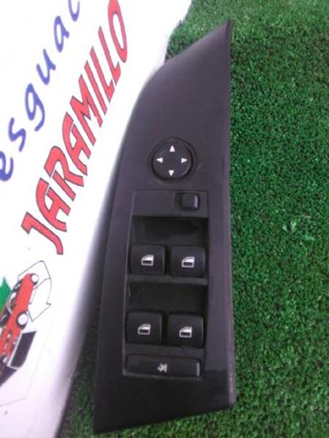Panel przyciskowy sterowania podnośnikiem szyby przedni lewy 6951904 BMW
