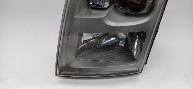 Reflektor lewy 6C1113W030DC FORD