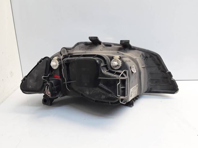 Reflektor lewy 6L1941021A VAG