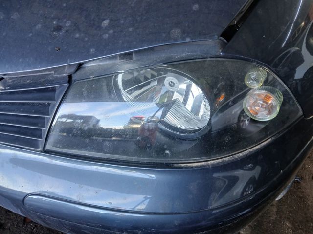 Reflektor lewy 6L1941021A VAG