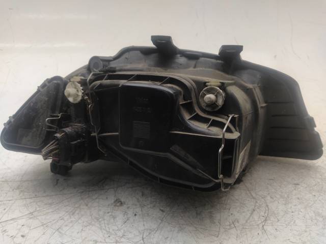 Reflektor lewy 6L1941021A VAG